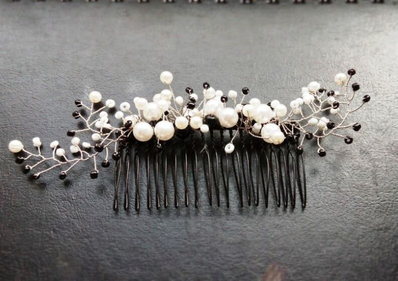 comb with beads as a charm of good luck